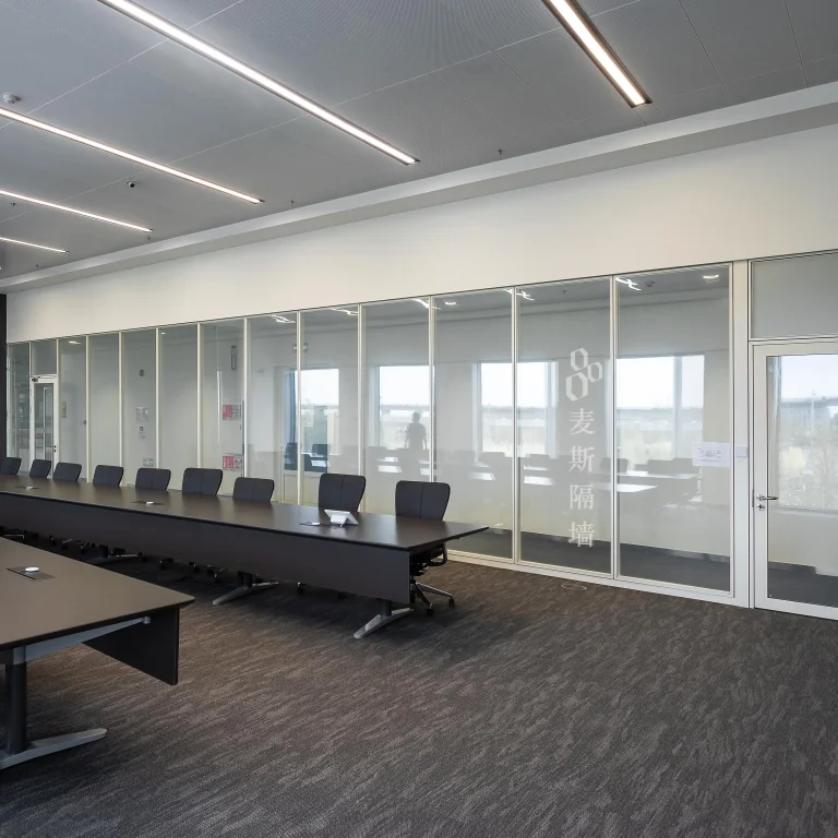 Glass partition cost guide — aluminum framed double glass partition system in modern boardroom