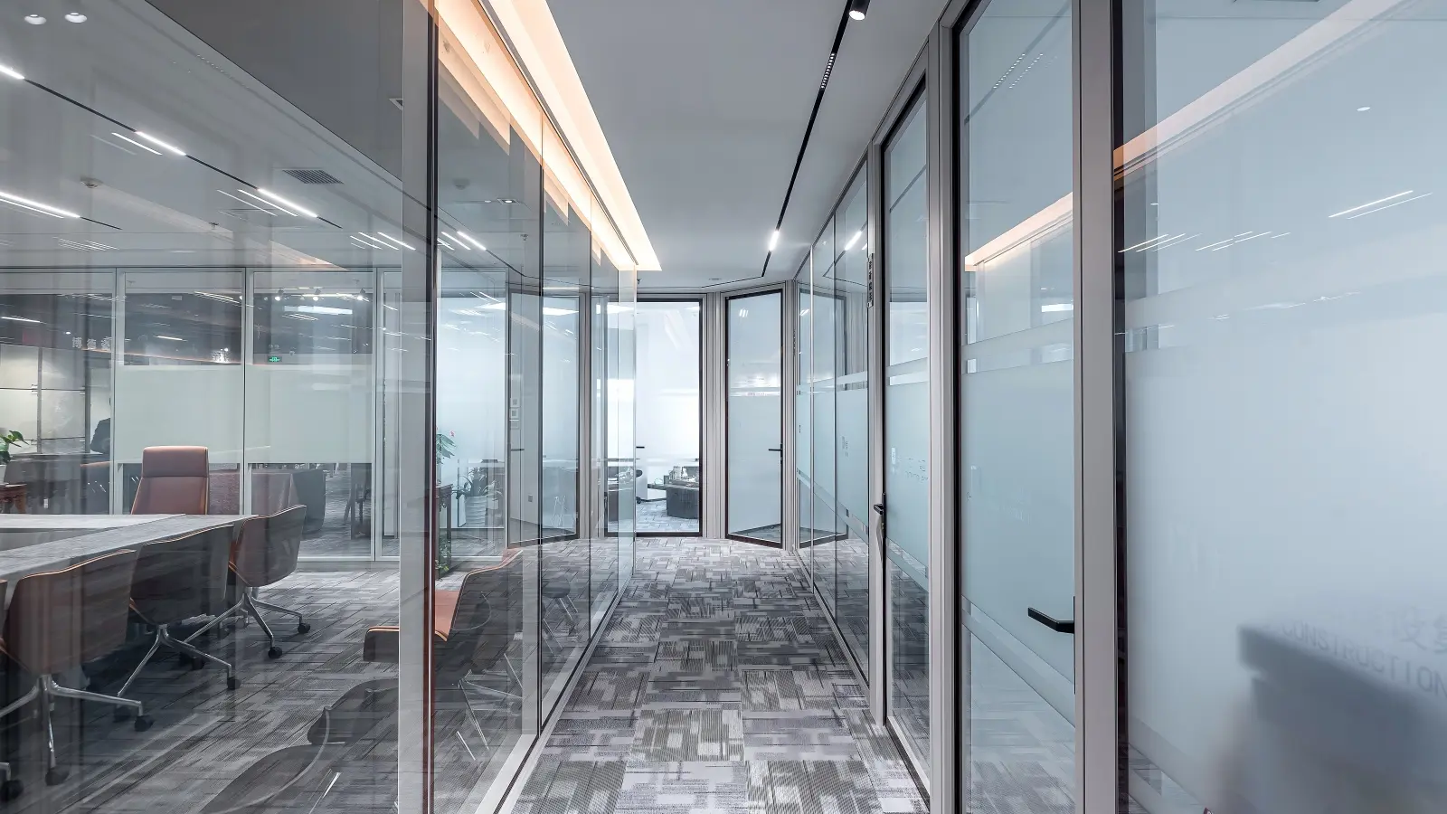 Modular glass partition prefabricated components — aluminum frame profile and glass panels arrive on site ready to assemble
